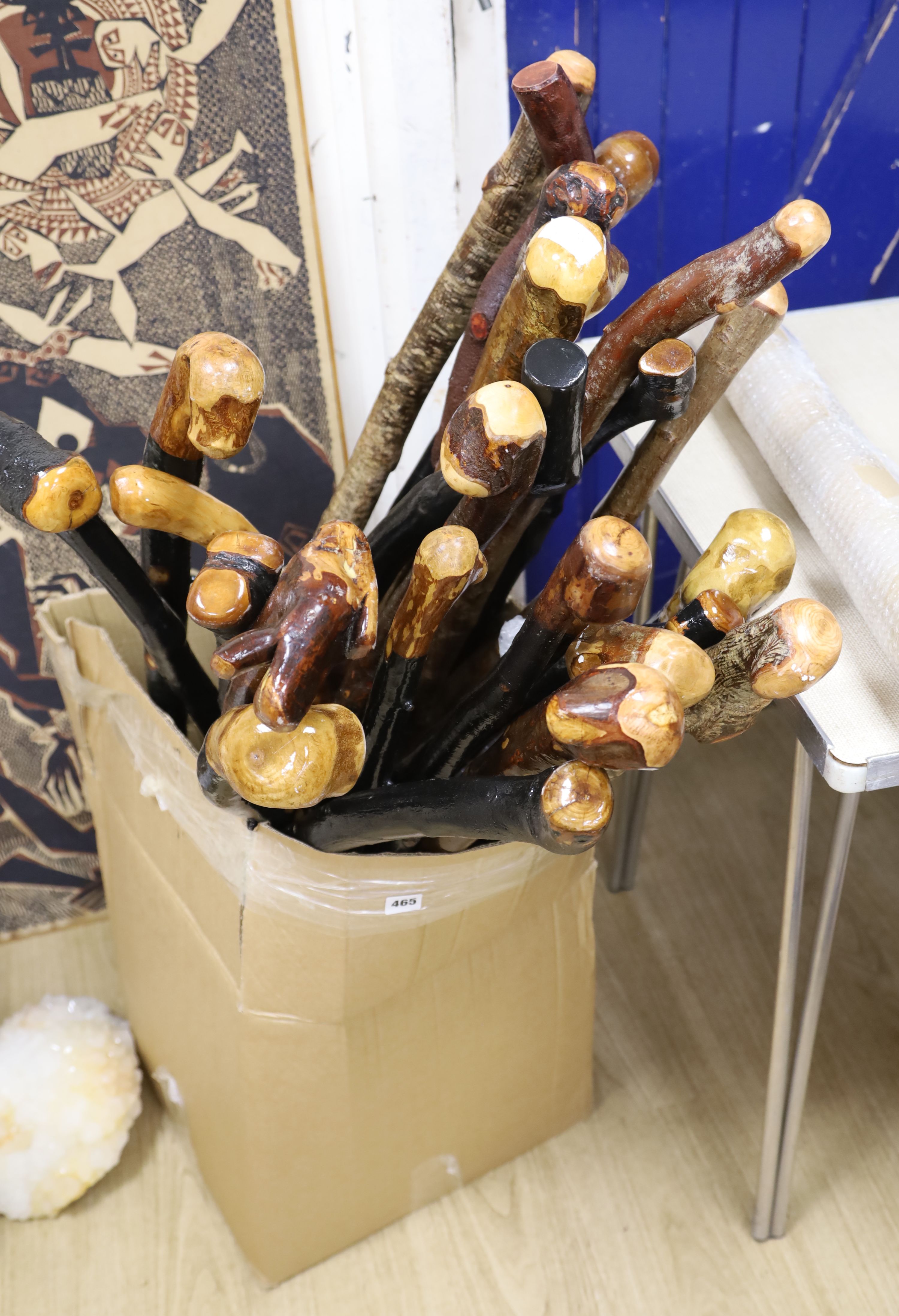 Approximately twenty two assorted provincial wood walking canes